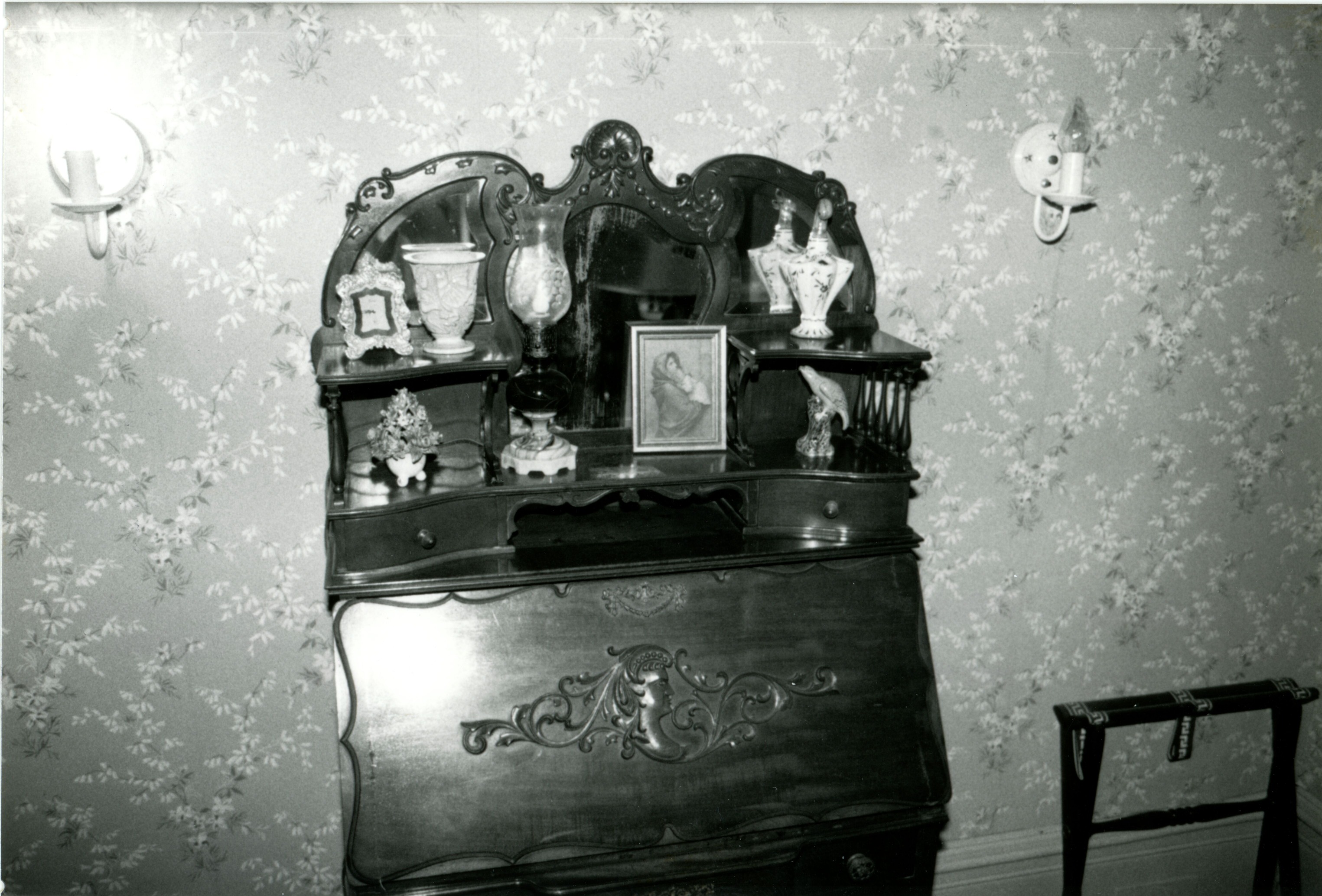 Master bedroom folding desk with nic nacs