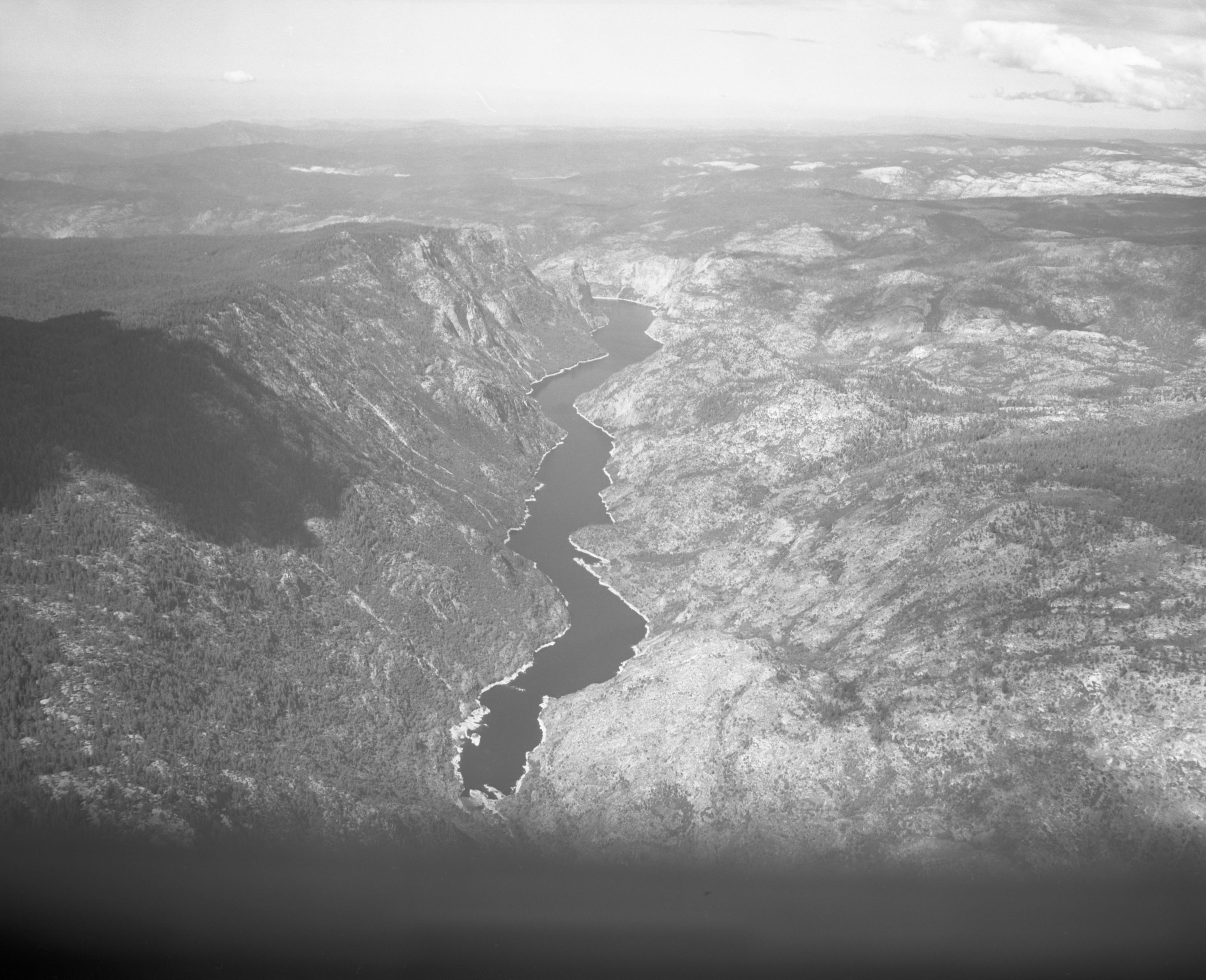Aerial photograph of Hetch Hetchy Reservoir from flight over park.