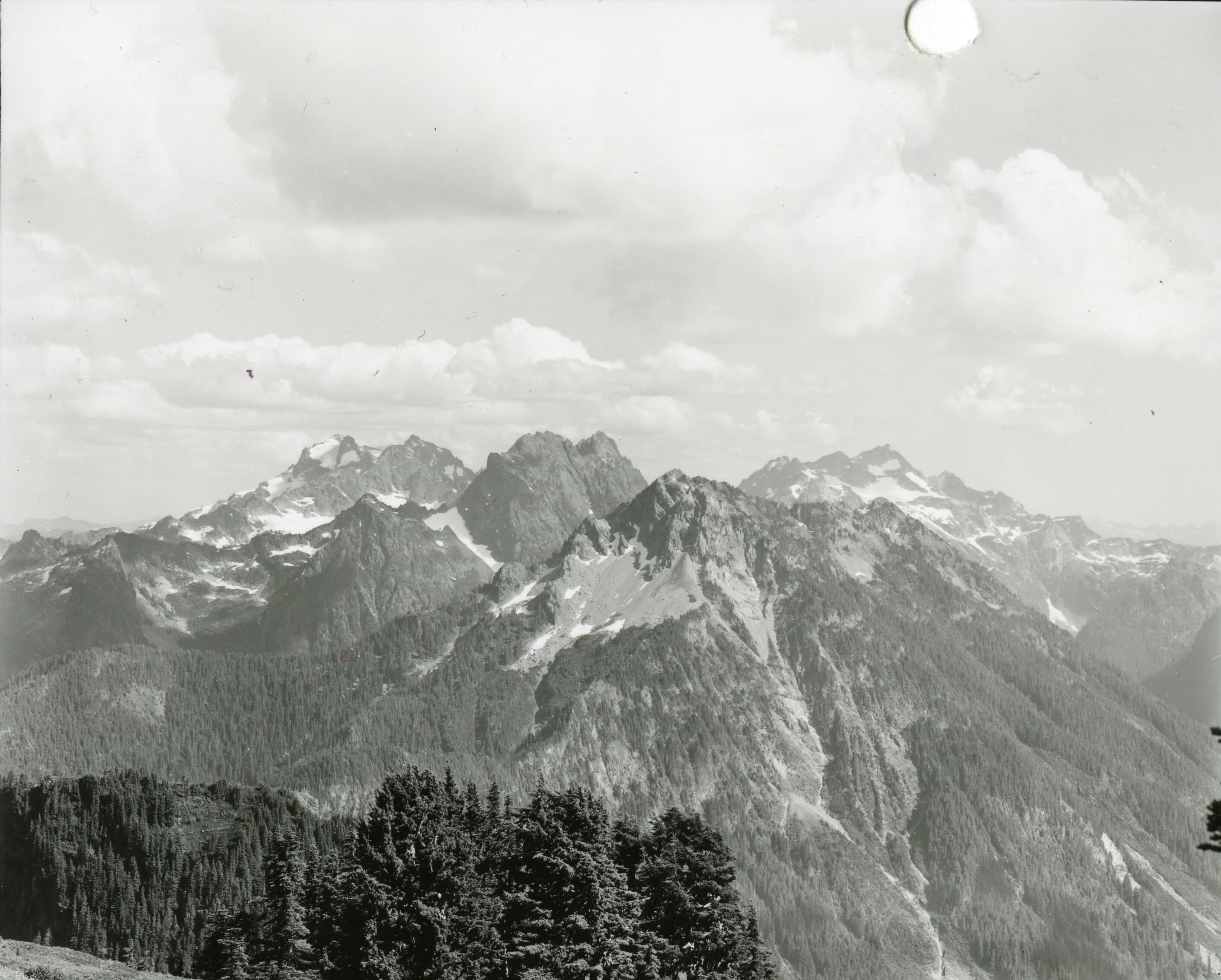 Multiple rocky peaks.