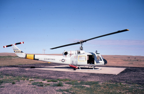 A helicopter at the ready on a small landing pad