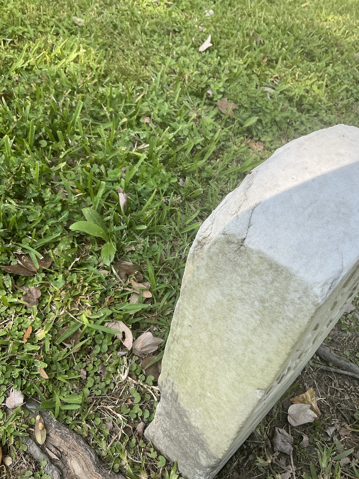 Extra image of historic upright marble headstone with recessed shield face.
