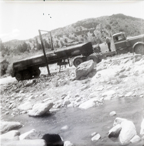 Construction vehicle in rocky area during chipsealing of Kolob Canyon Road.