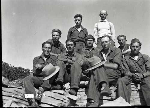Mountain rescue, Emergency Conservation Work (ECW) enrollees and Park Naturalist Presnall on summit of West Temple.