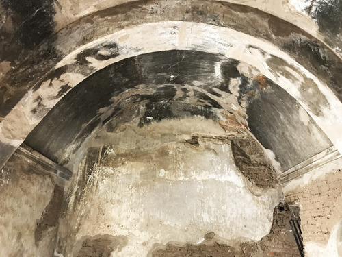view of barrel-vaulted ceiling, blackened