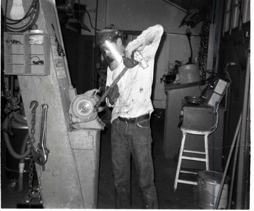 BW Photo of Navajo workers in wood shop.