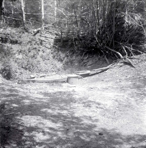 Park personnel installing a culvert/drainage pipe in location in Zion.