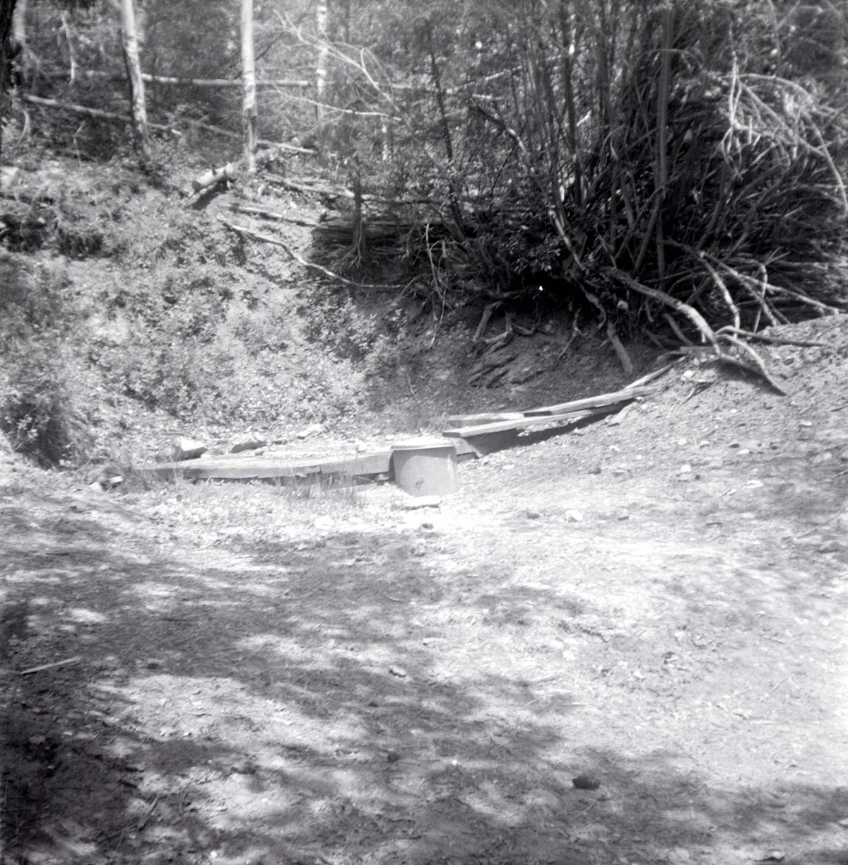 Park personnel installing a culvert/drainage pipe in location in Zion.