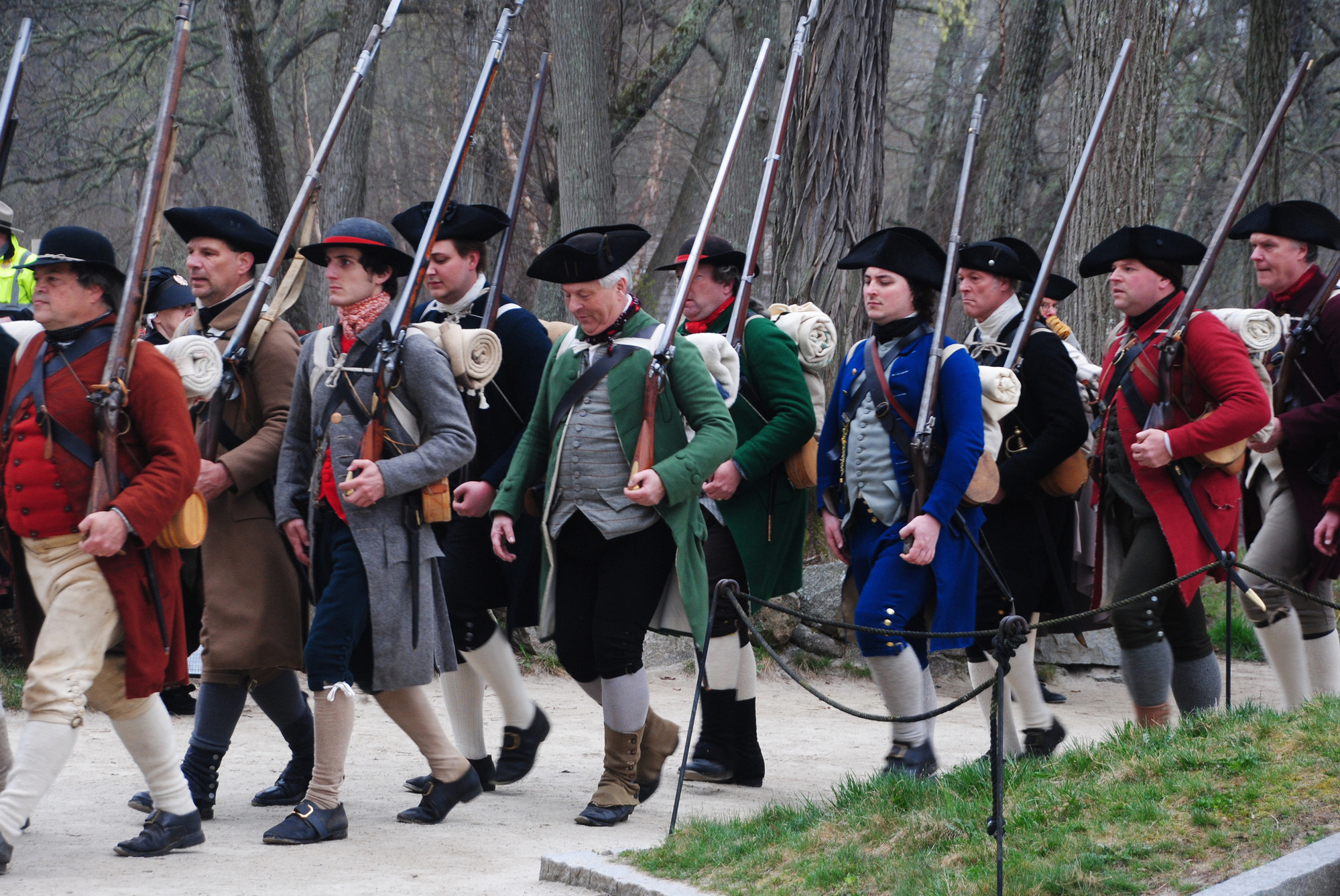 Company of minute men marching over the North Bridge 