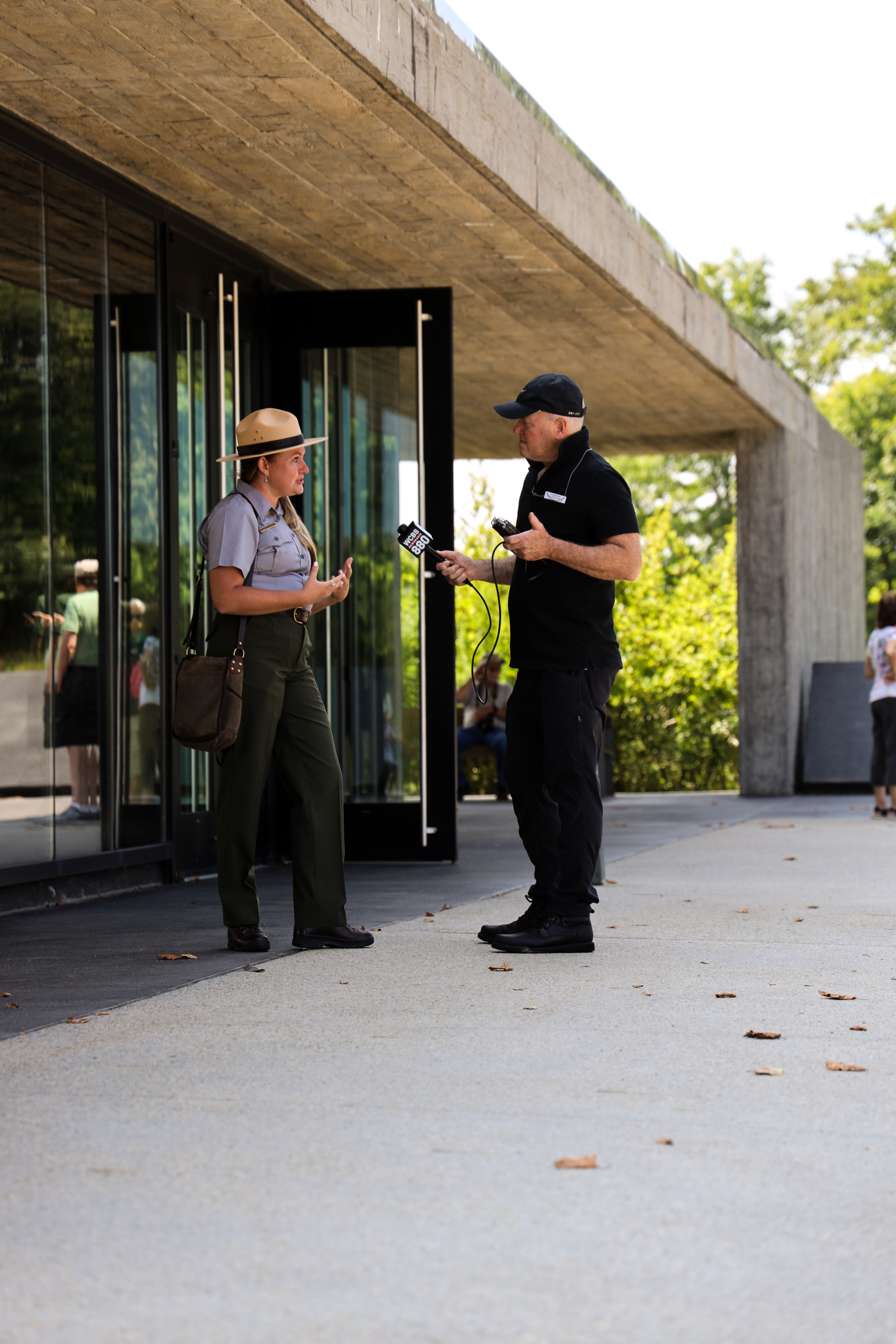 Flight 93 Park Ranger Katie speaking to a reporter at the Visitor Center located at the Memorial Plaza.