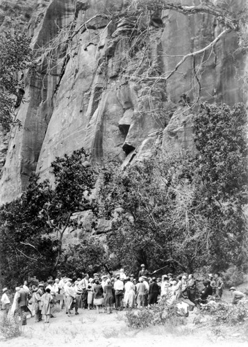 Park naturalist Angus M. Woodbury with tourist party at the Temple of Sinawava.