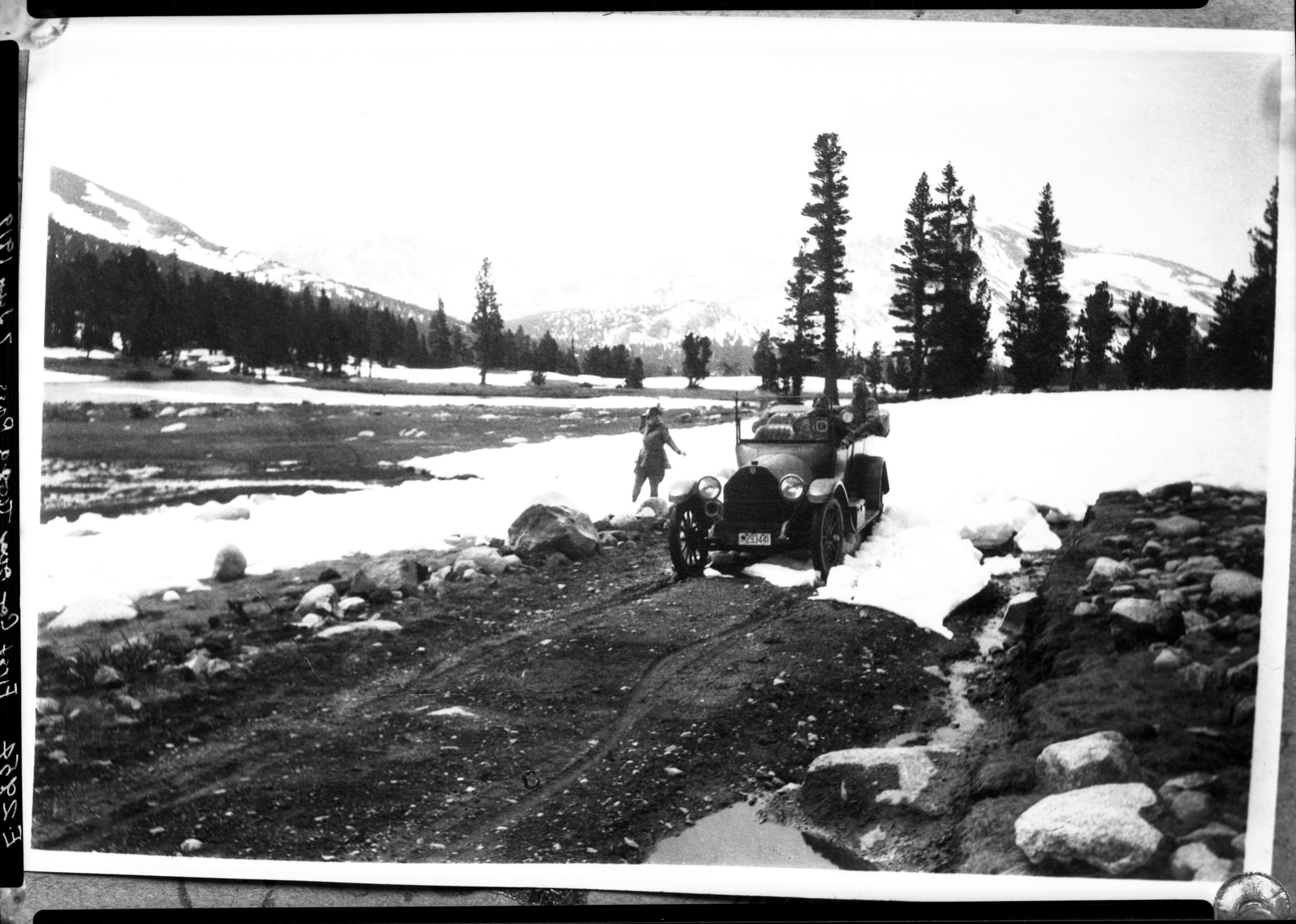 First car over Tioga Pass. [SLIDE: 201-SL09-1166].