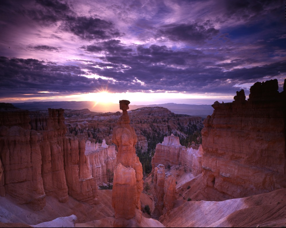 Thor's Hammer at sunrise on a cloudy day, sun breaking through the clouds.