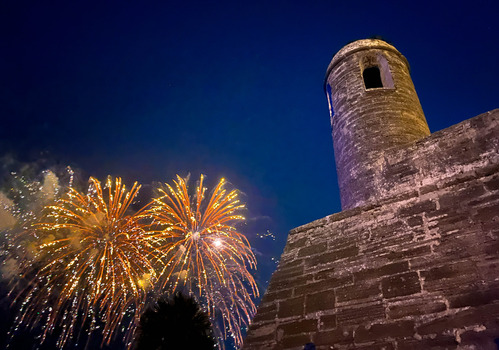 Colorful fireworks over a colonial Spanish fort 