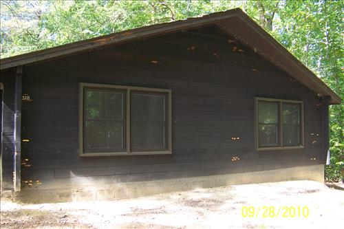 Replace windows and doors to improve energy efficiency at cabin camp 5 in Prince William Forest Park in September 2010 ARRA update