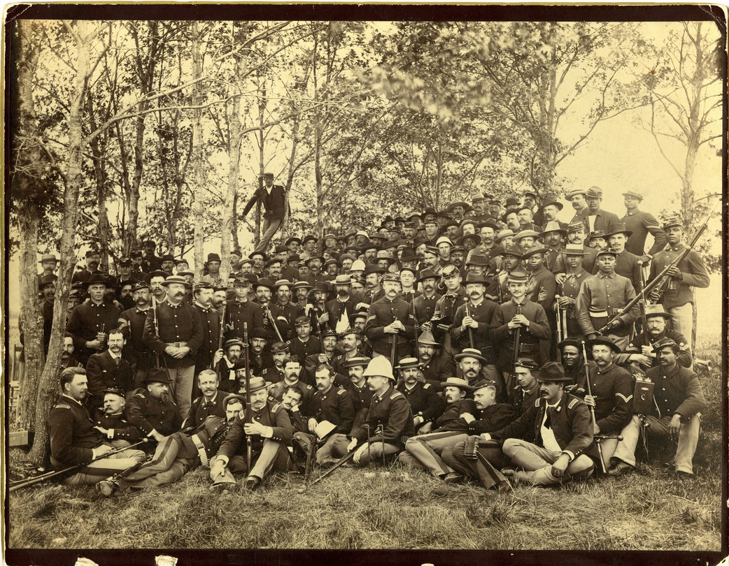 The Rifle Team from Fort Abraham Lincoln in a Grove of Trees