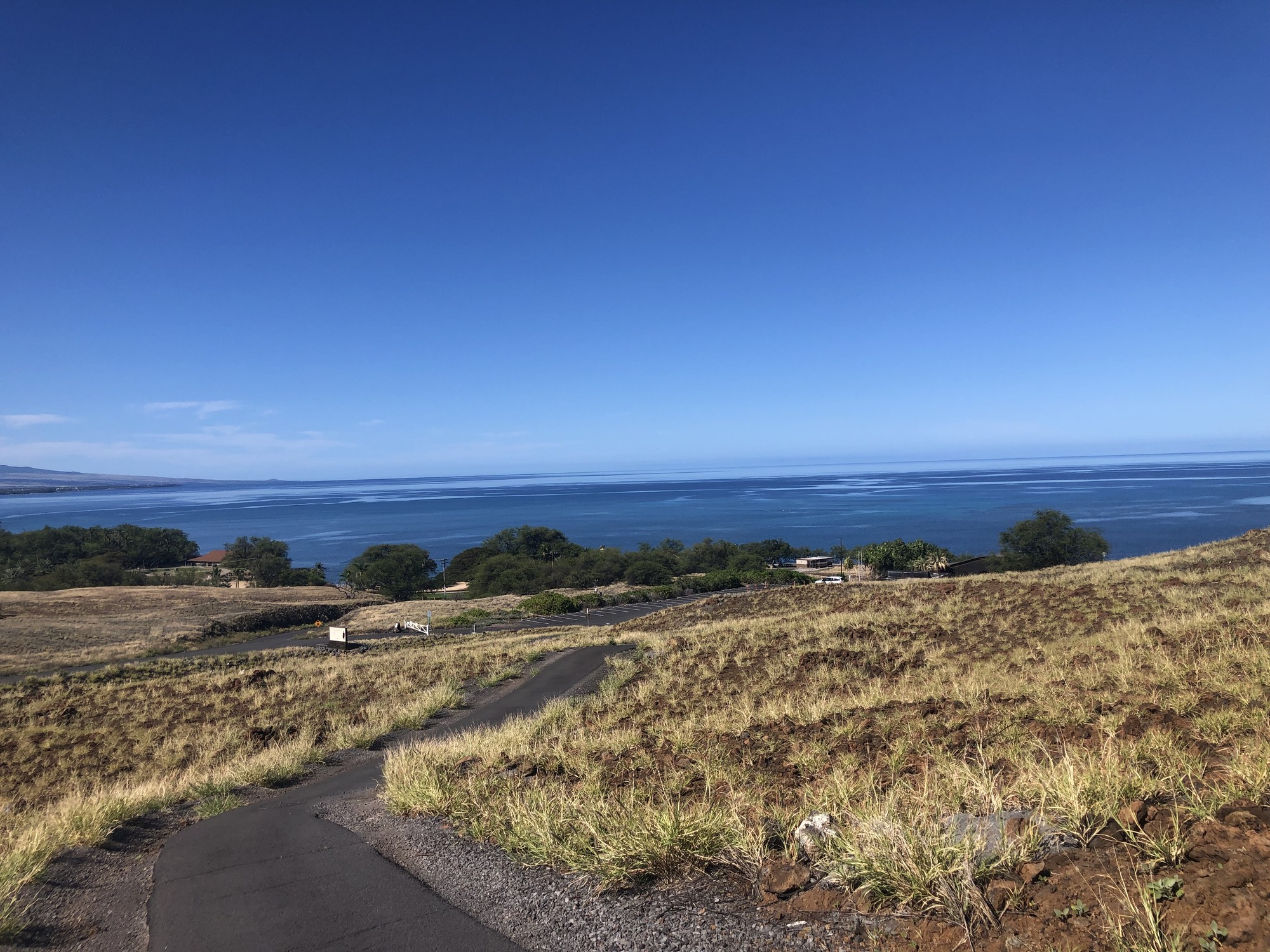 Viewing south towards Kona coast (west side on Hawai'i Island) an old trail from headquarters to visitor center. Spencer county beach park located just below the center.