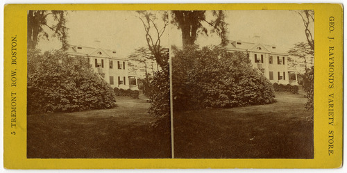 Large bush obscures most of Georgian mansion. Black and white sterograph with writing around photos.