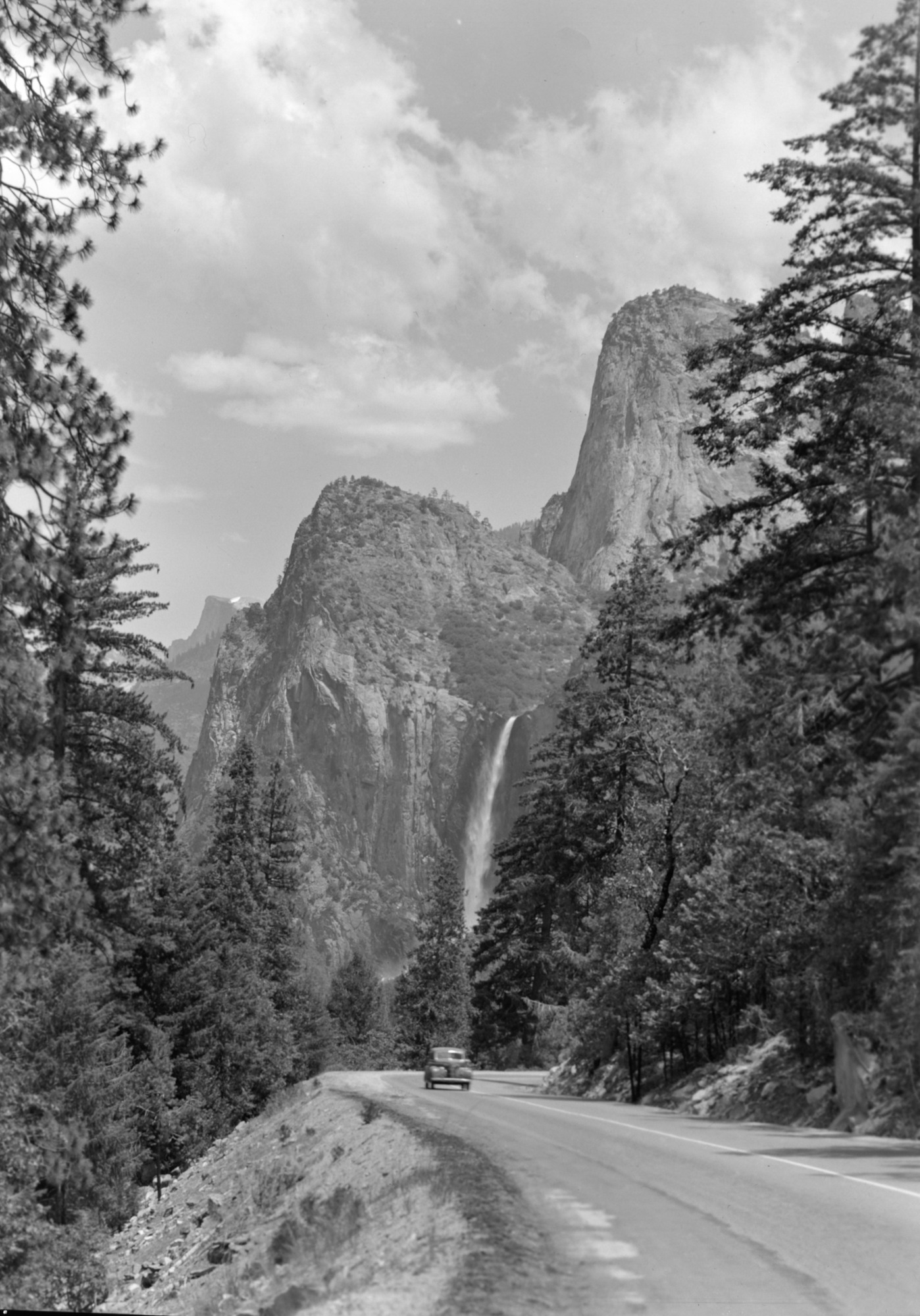 Car on the Wawona Rd. with Bridalveil Fall.