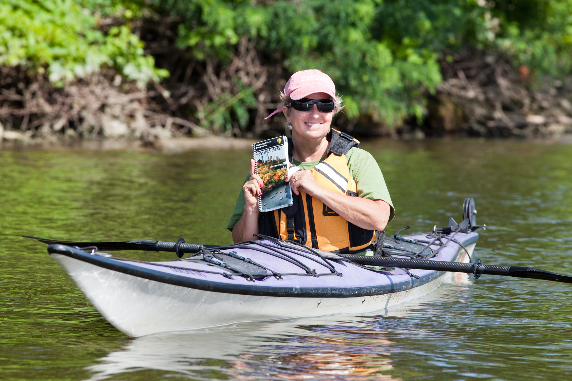 Image of Susan Overson kayaking on the Mississippi River in 2010. 