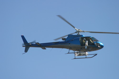 AStar AS 350 B2 helicopter flying in the air