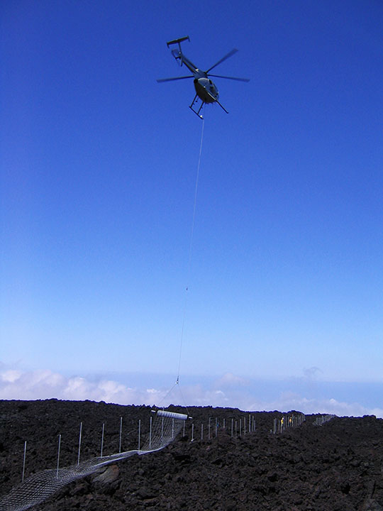 helicopter flying high in the sky