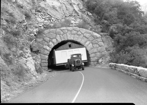 Building used at the Ahwahnee during the Navy occupation being transported to Crane Flat by way of Big Oak Flat Road and tunnel. See RL-19,834-19,838.