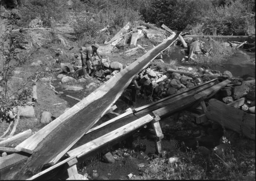 Sugar Pine Flume showing intake & dirt dam. Note leaky old flume.