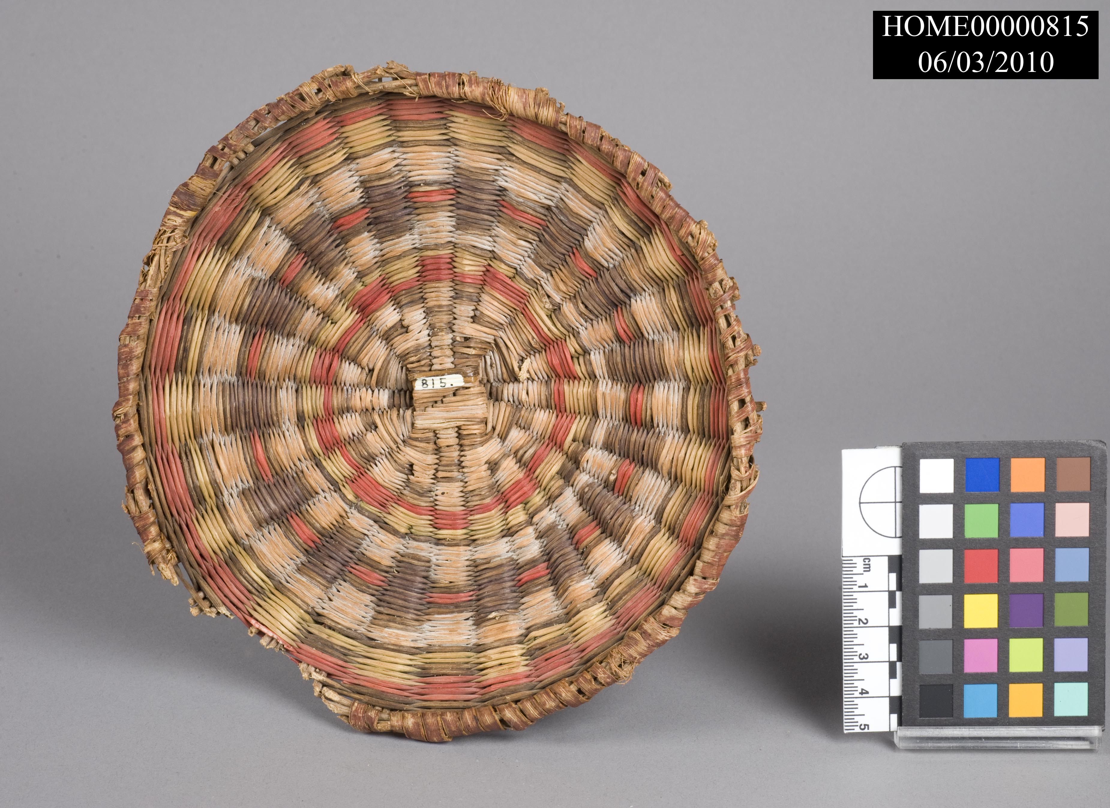 Dome shaped lid based on a frame work of twigs or small vines