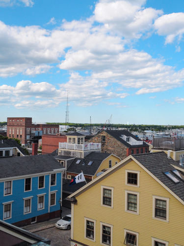 Colorful view of the buildings in Downtown New Bedford, looking towards the harbor.
