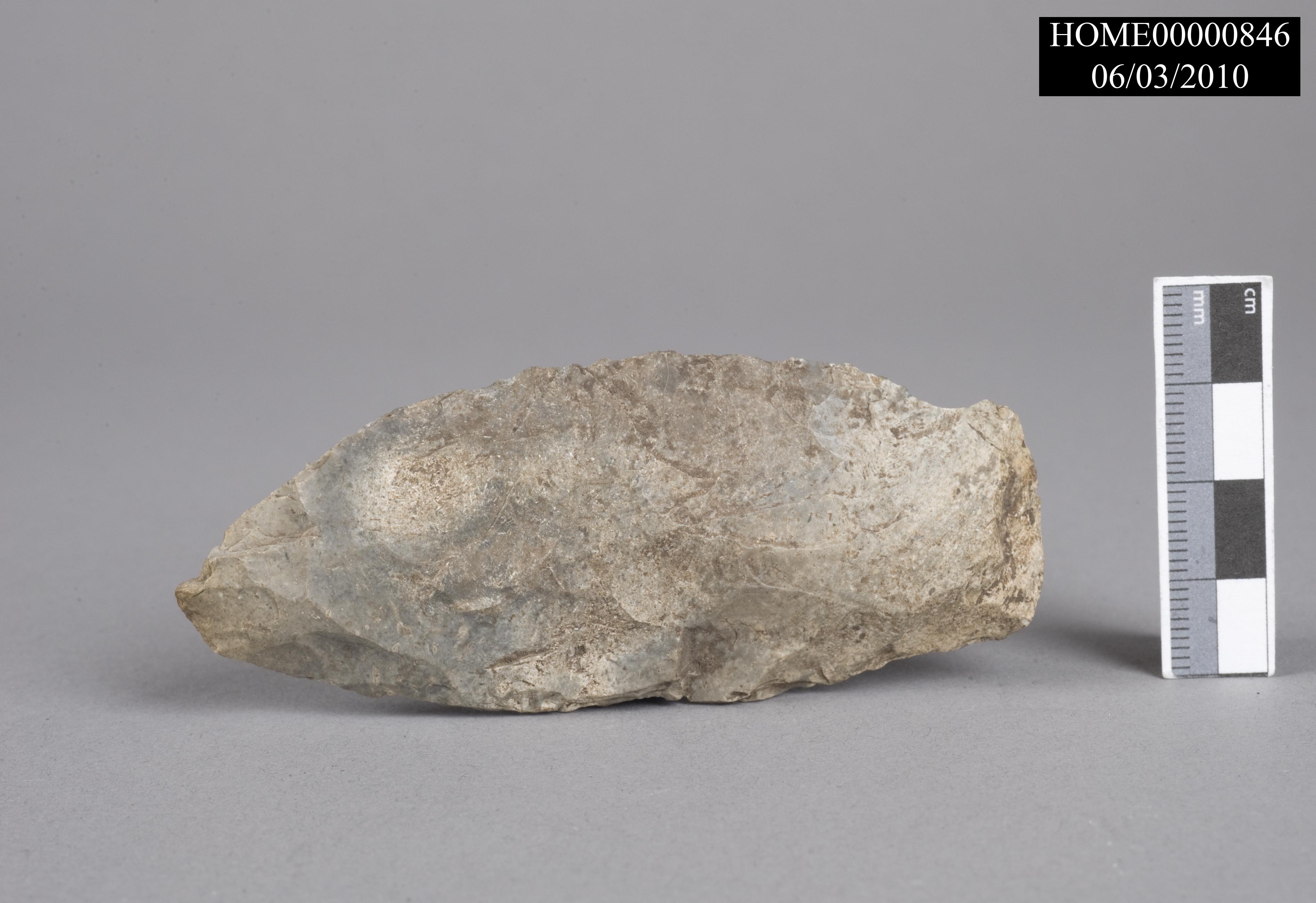 Unnotched projectile point made of gray stone