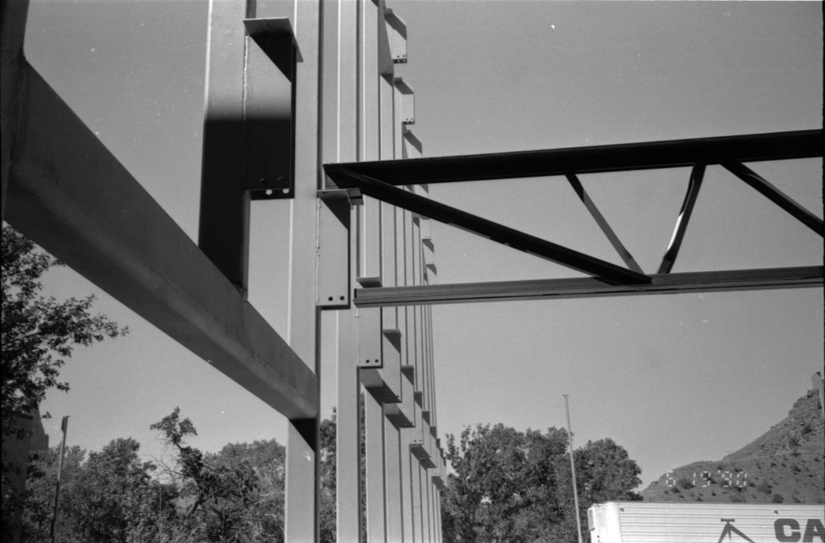 Supporting beams during the construction of headquarters addition.
