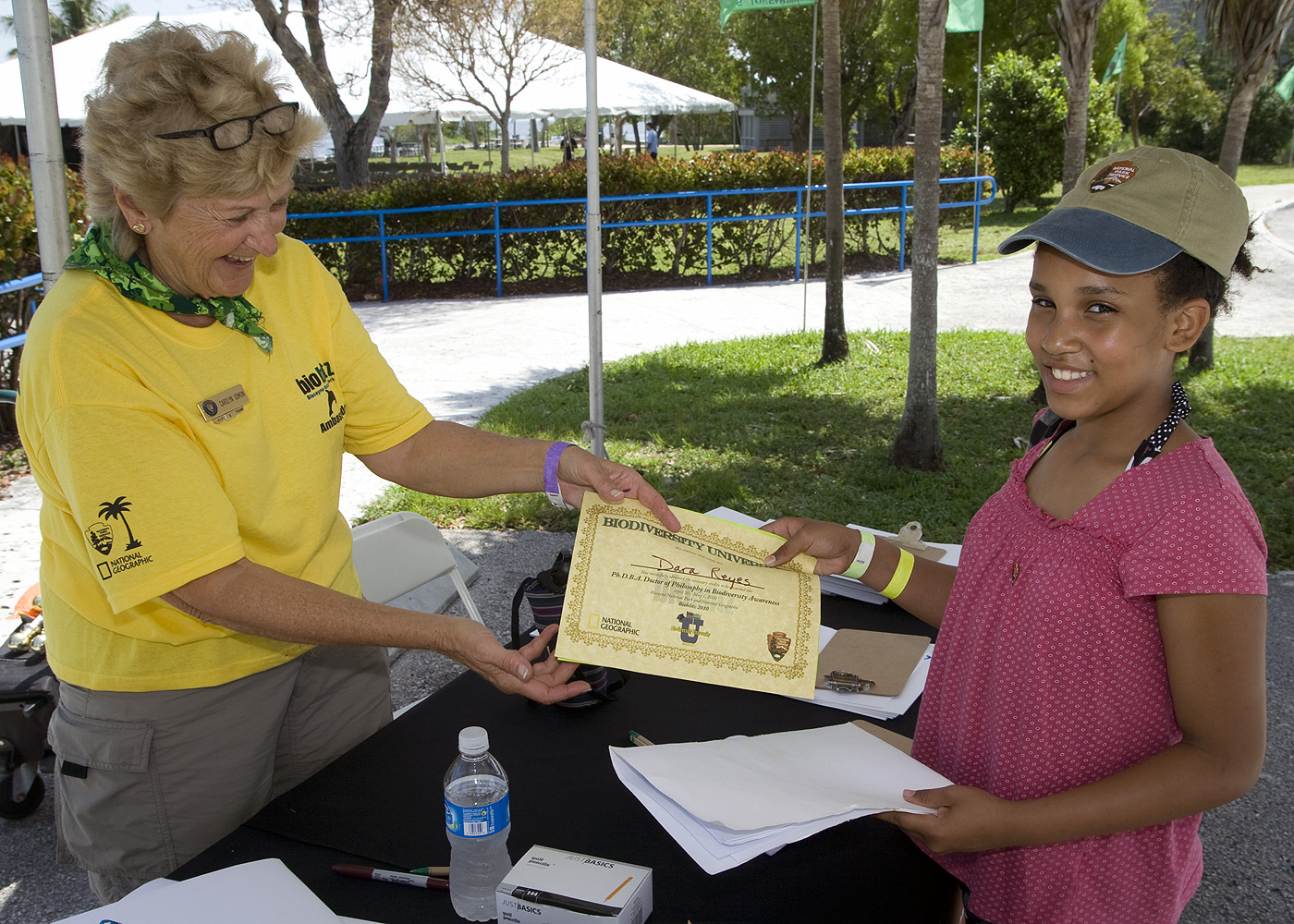 Biodiversity youth ambassador Dara receiving certificate. 
