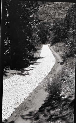 Narrows Trail construction, station 7-00, looking north, with base course of gravel ready for 1/4 to 1/2 inch screenings.