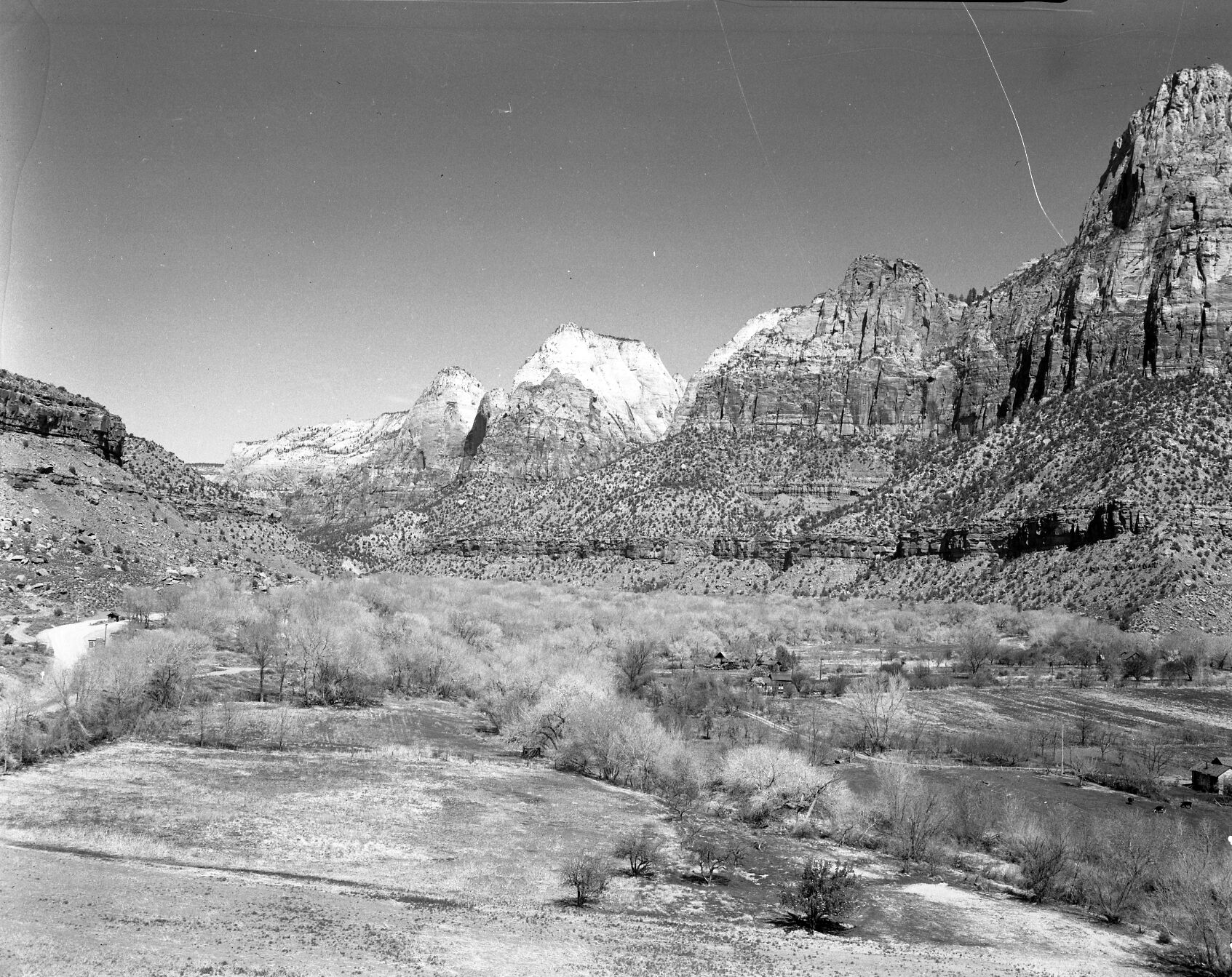 The Springdale member of the Moenave, from knoll behind Zionville, north up canyon.