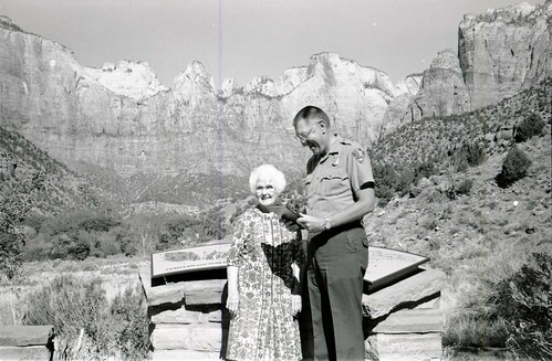 BW Photos of Superintendent Harold Grafe giving award to lady.