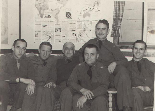 Group of men seated inside