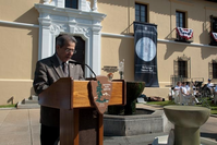 The Director of the Midwest Regional Office of the National Park Service Ernie Quintana speaks to the crowd about the importance of national parks.
