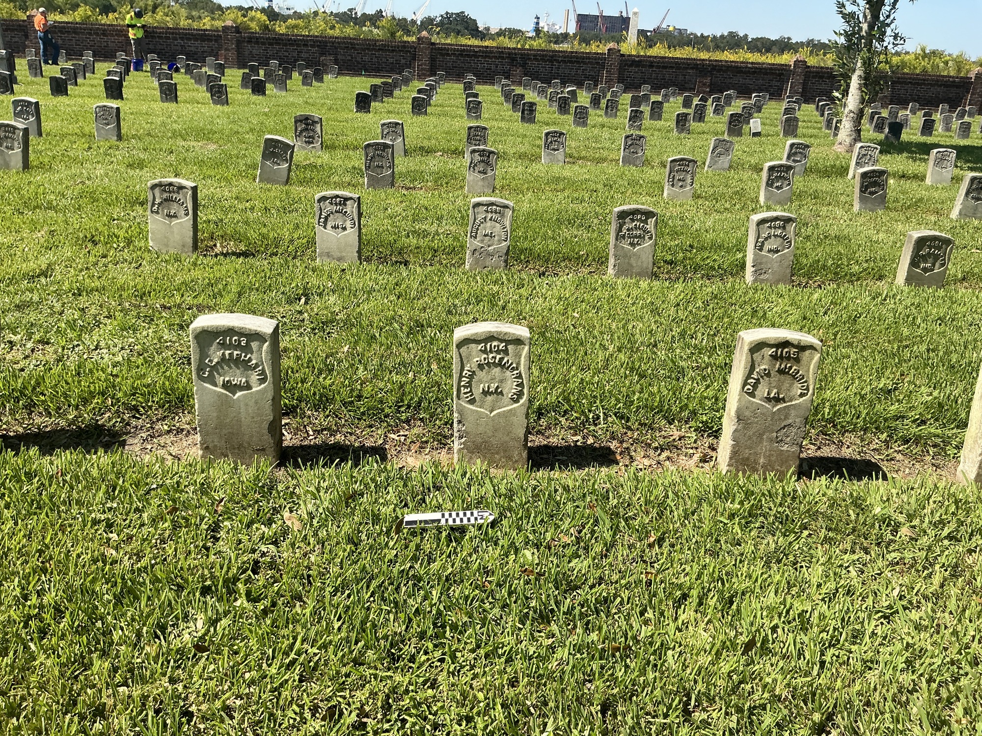 Extra image of historic upright marble headstone with recessed shield face.