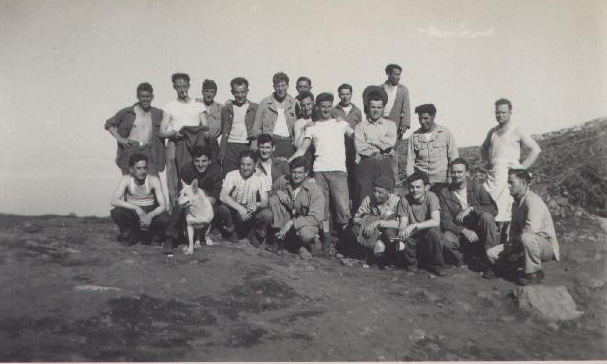 Large group of men posing outside