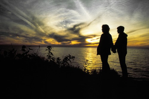 A couple enjoying the sunset.
