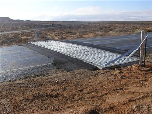 Construction of cattleguard and livestock fence to help enclose the Bullfrog Marina Developed Area (GLCA) in the fall of 2007