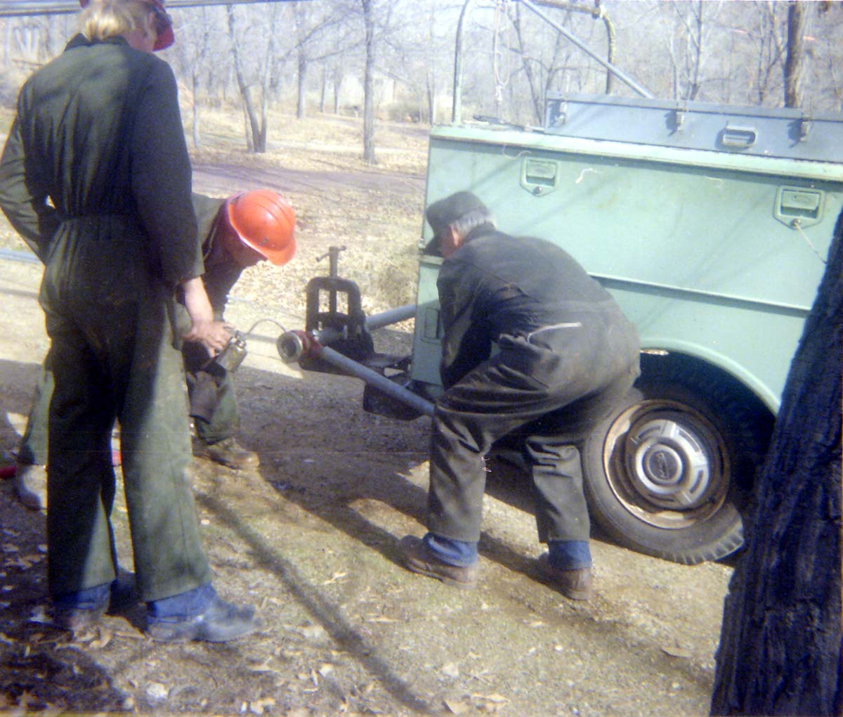 Workers using construction vehicle during the Zion Lodge utilities project.