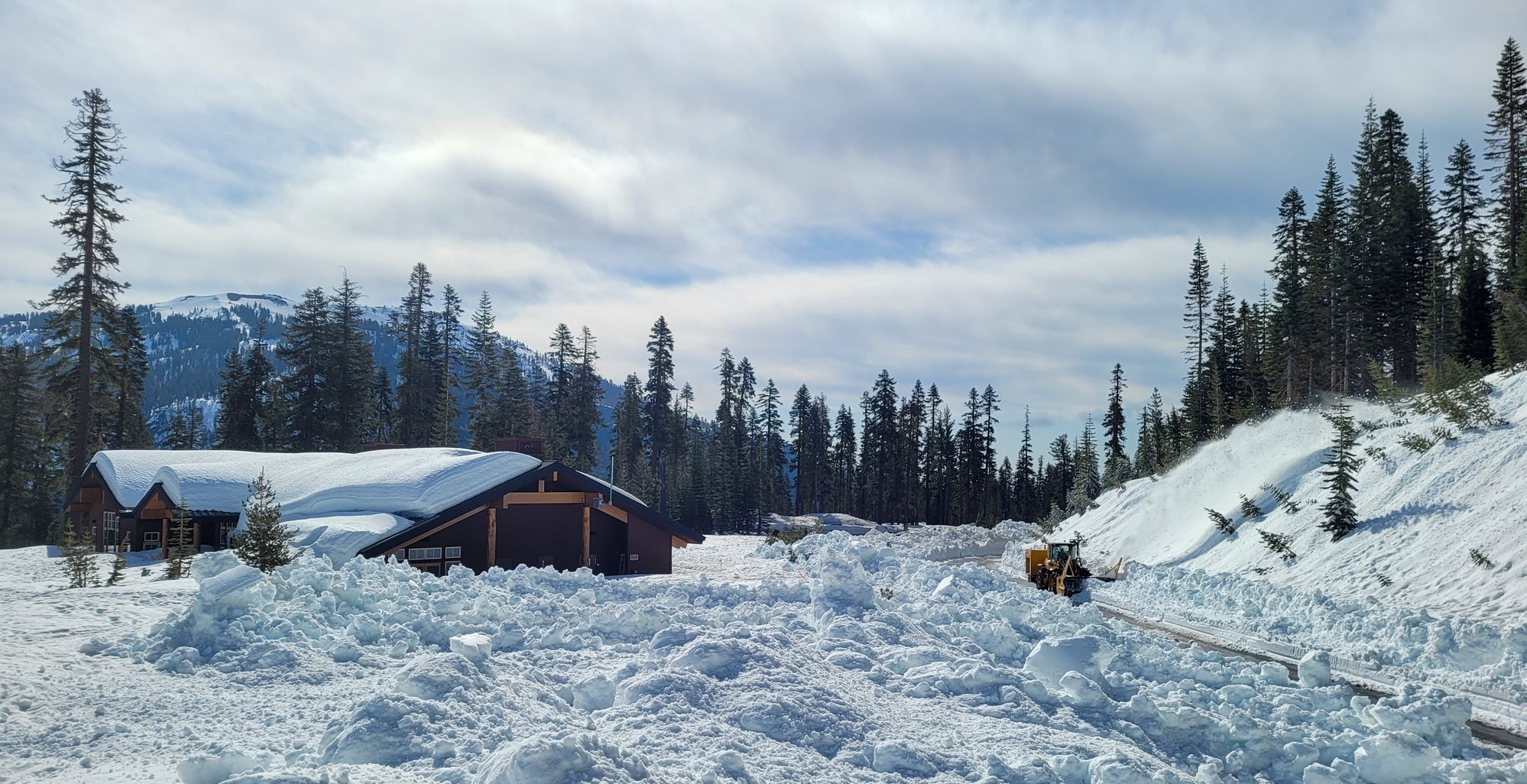 Snow Clearing on Lassen Volcanic Highway. Rotary plow next to the Kohm Yah-mah-nee Visitor Center. 