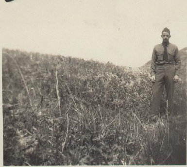 Uniformed man in field