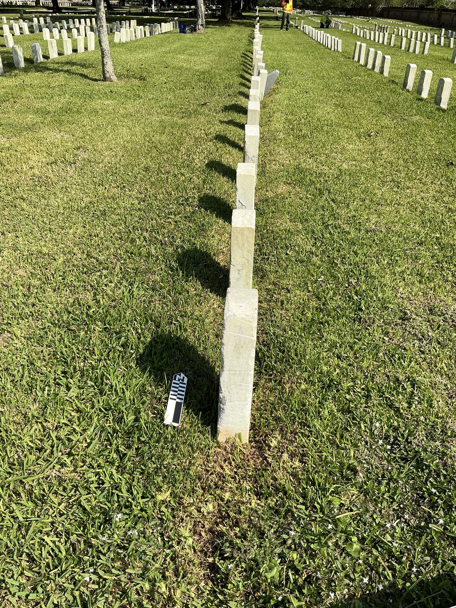Extra image of historic upright marble headstone with recessed shield face.