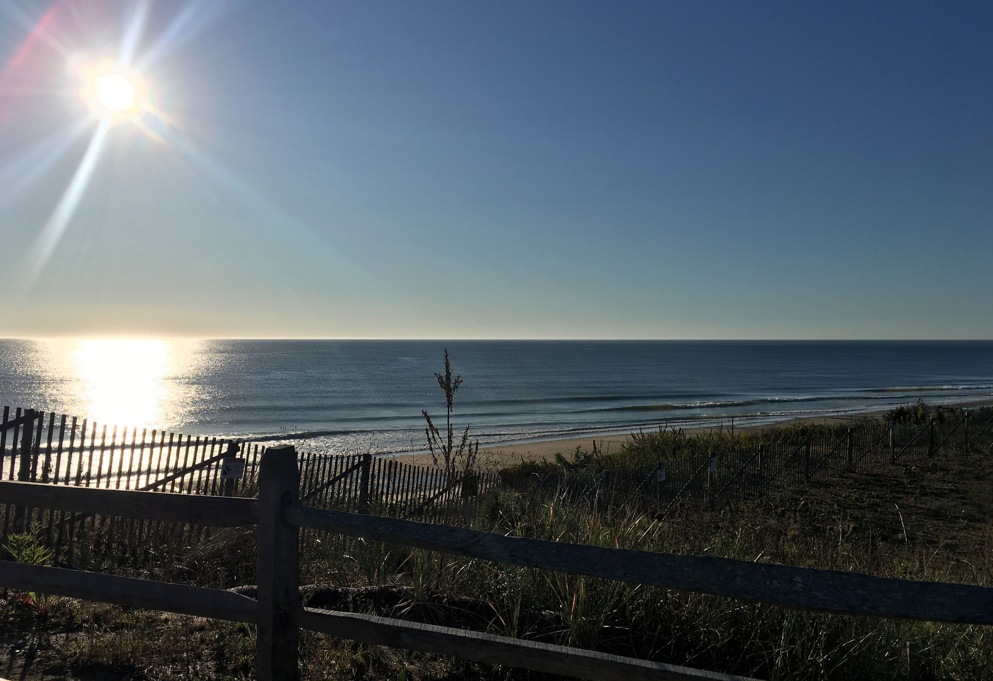 Sun rises on Nauset Light Beach