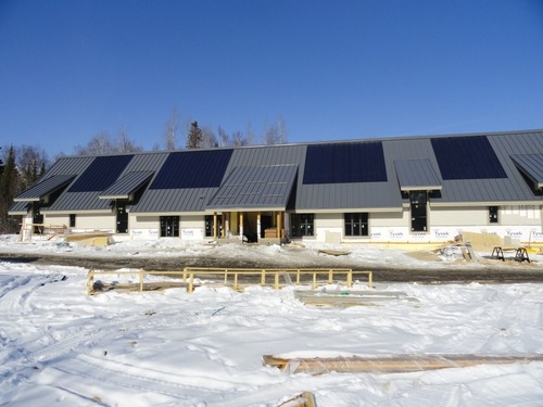 Completed roof and Blue solar panels