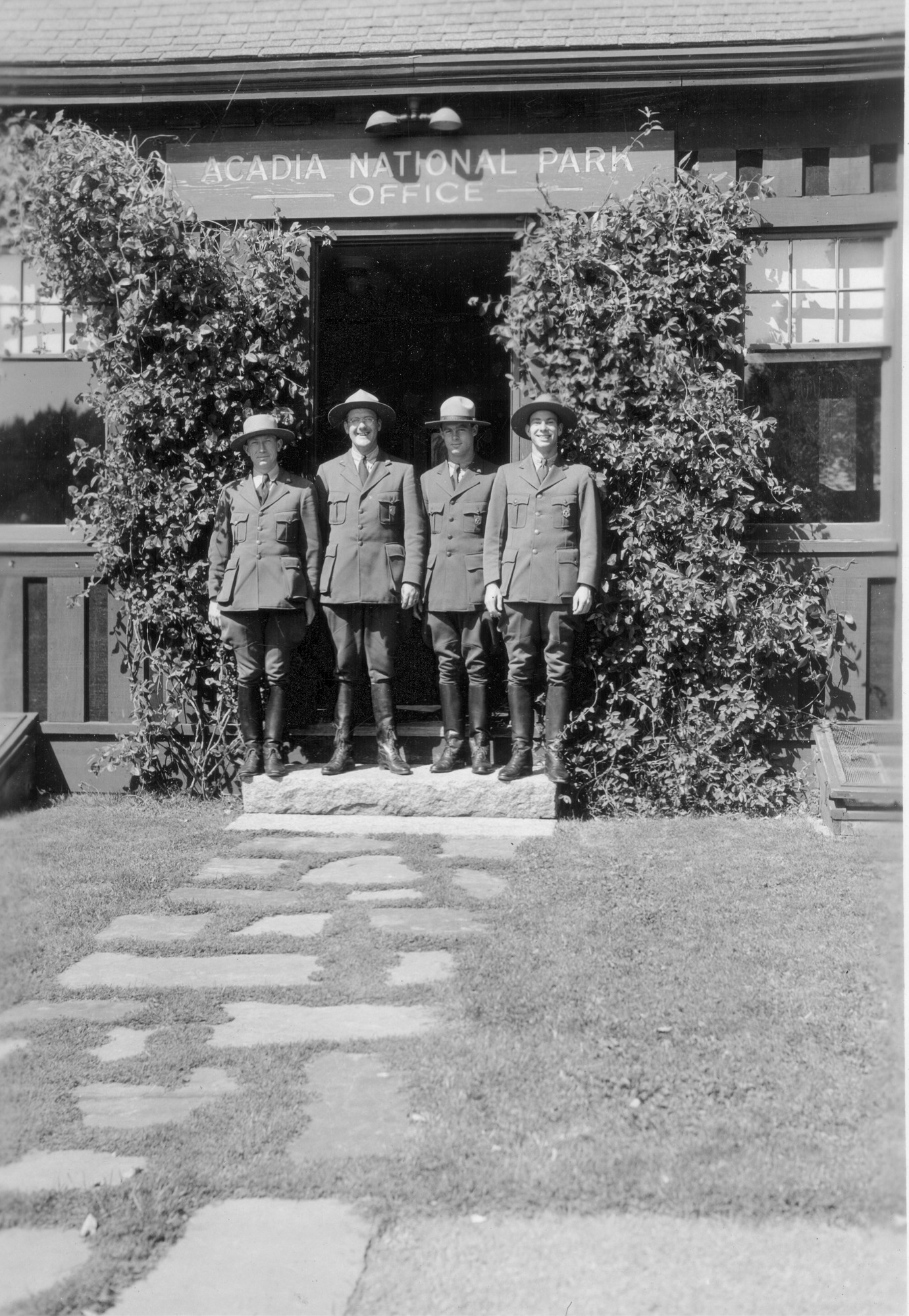 NATURALIST FORCE IN PARK OFFICE DOORWAY