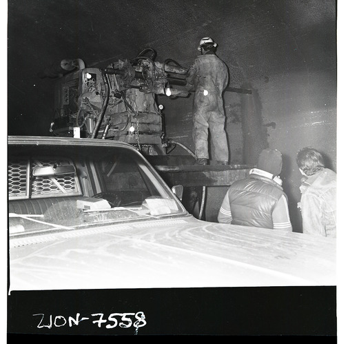 Machinery and crews drilling test cores in Zion-Mt. Carmel tunnel.
