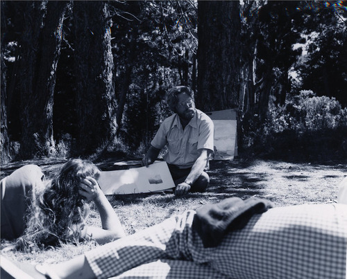 Art-in-residence Bruce McGrew with visitors in Art workshop at Hosmer Grove. 